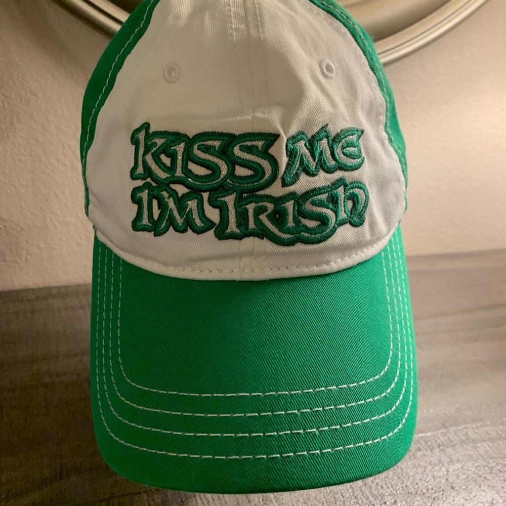 Green and white baseball hat.